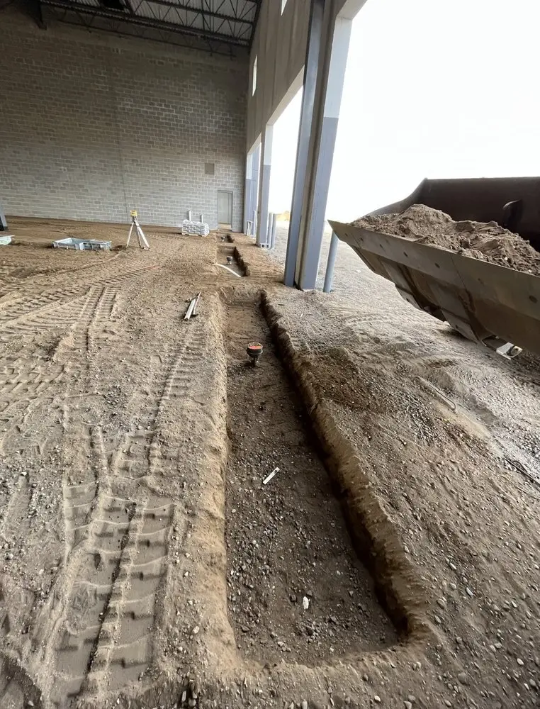 Trenching for utilities inside a commercial building shell, Minneapolis MN